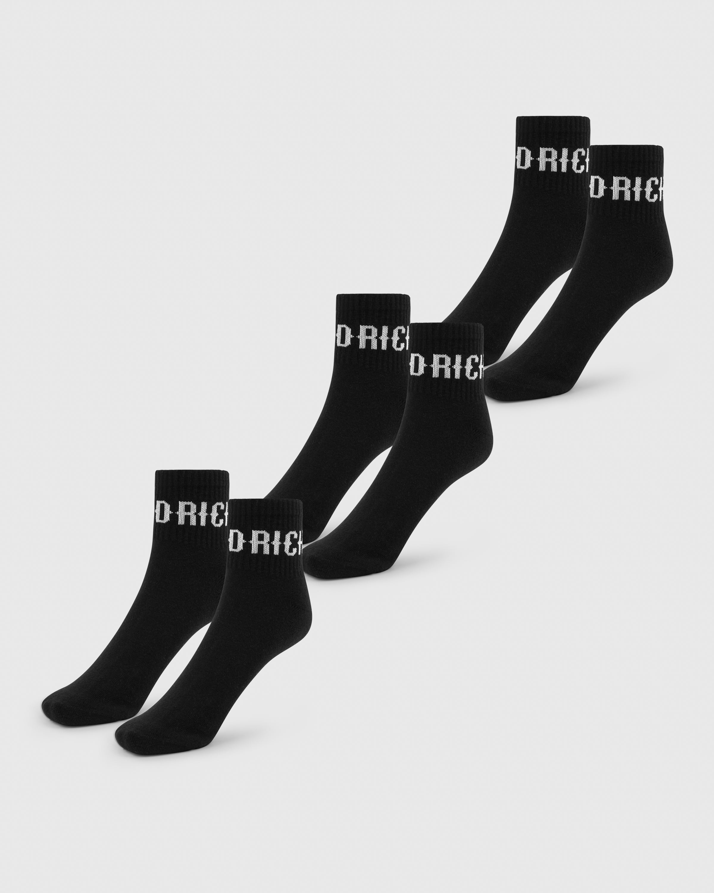 Set of black socks with 'Hoodrich' branding on a light gray background
