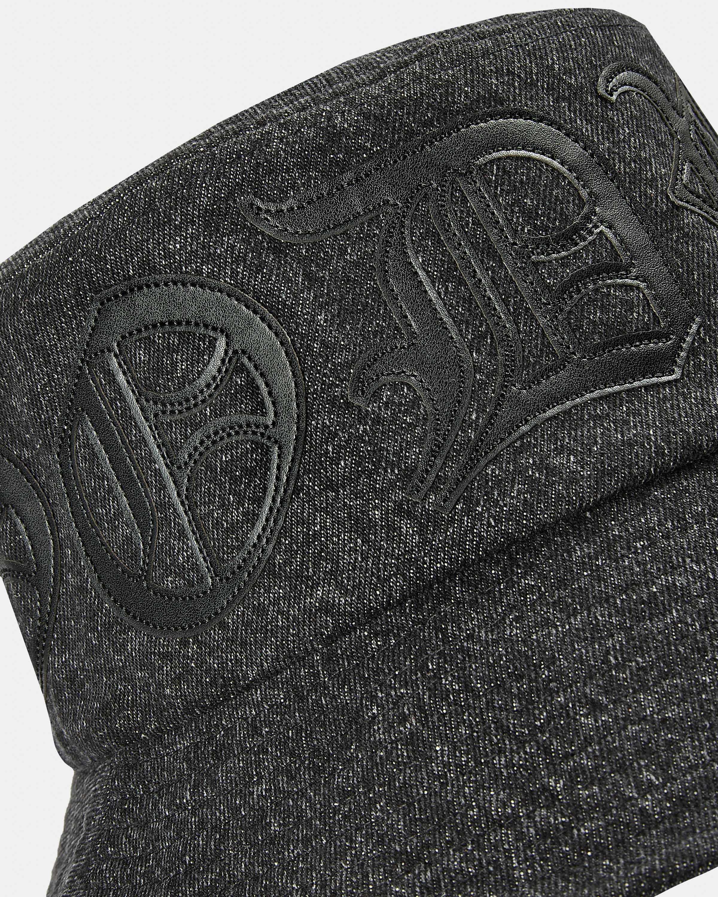 Denim bucket hat with applique PU logo saying 'Hoodrich'