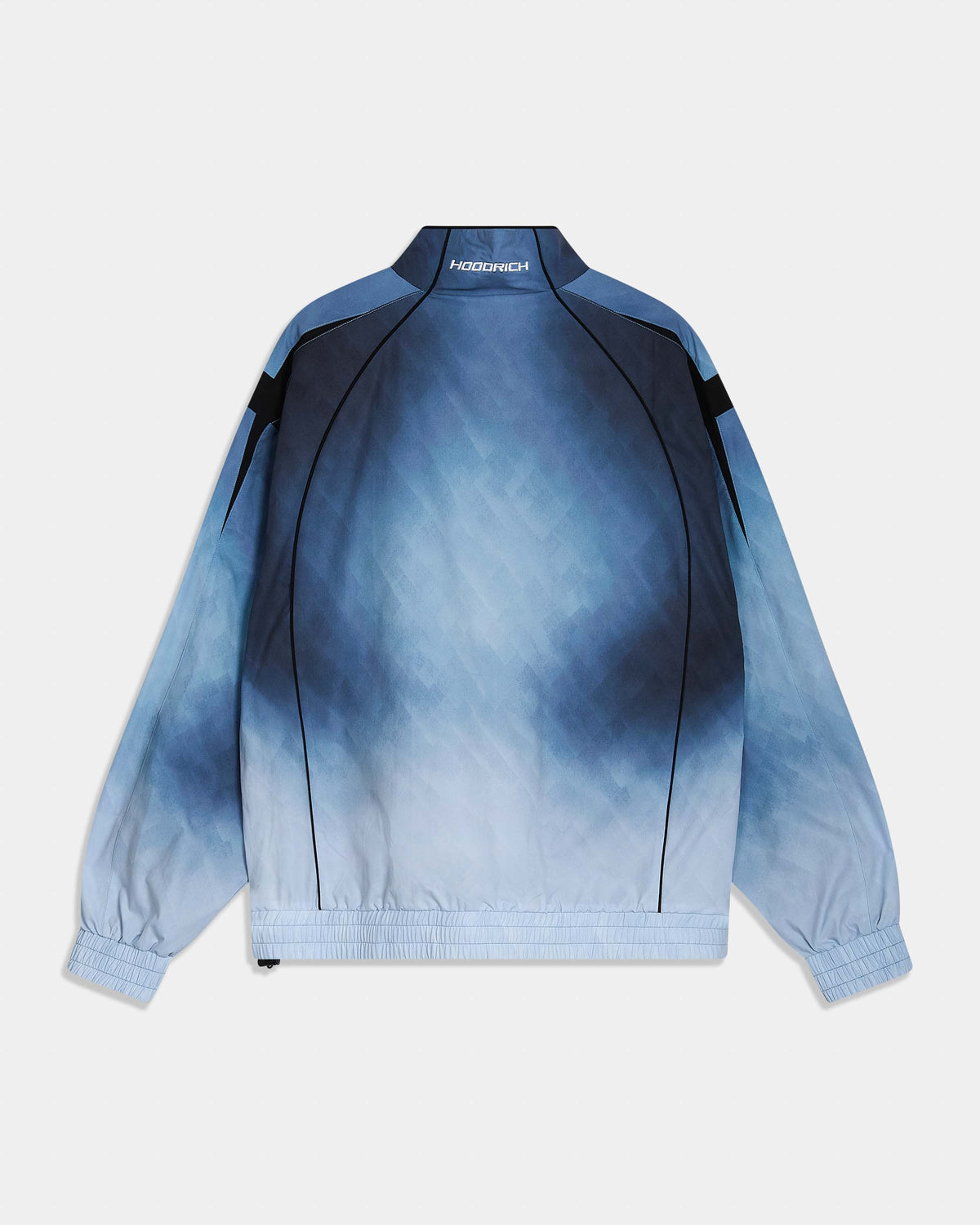A long-sleeve bomber jacket with Hoodrich on the neckline, shown from the back. The jacket features a blue and white tie-dye gradient pattern with solid dark blue panels on the shoulders and upper back, black piping details, and elastic cuffs and hem.