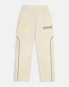 Beige pants with a brand logo on a light gray background