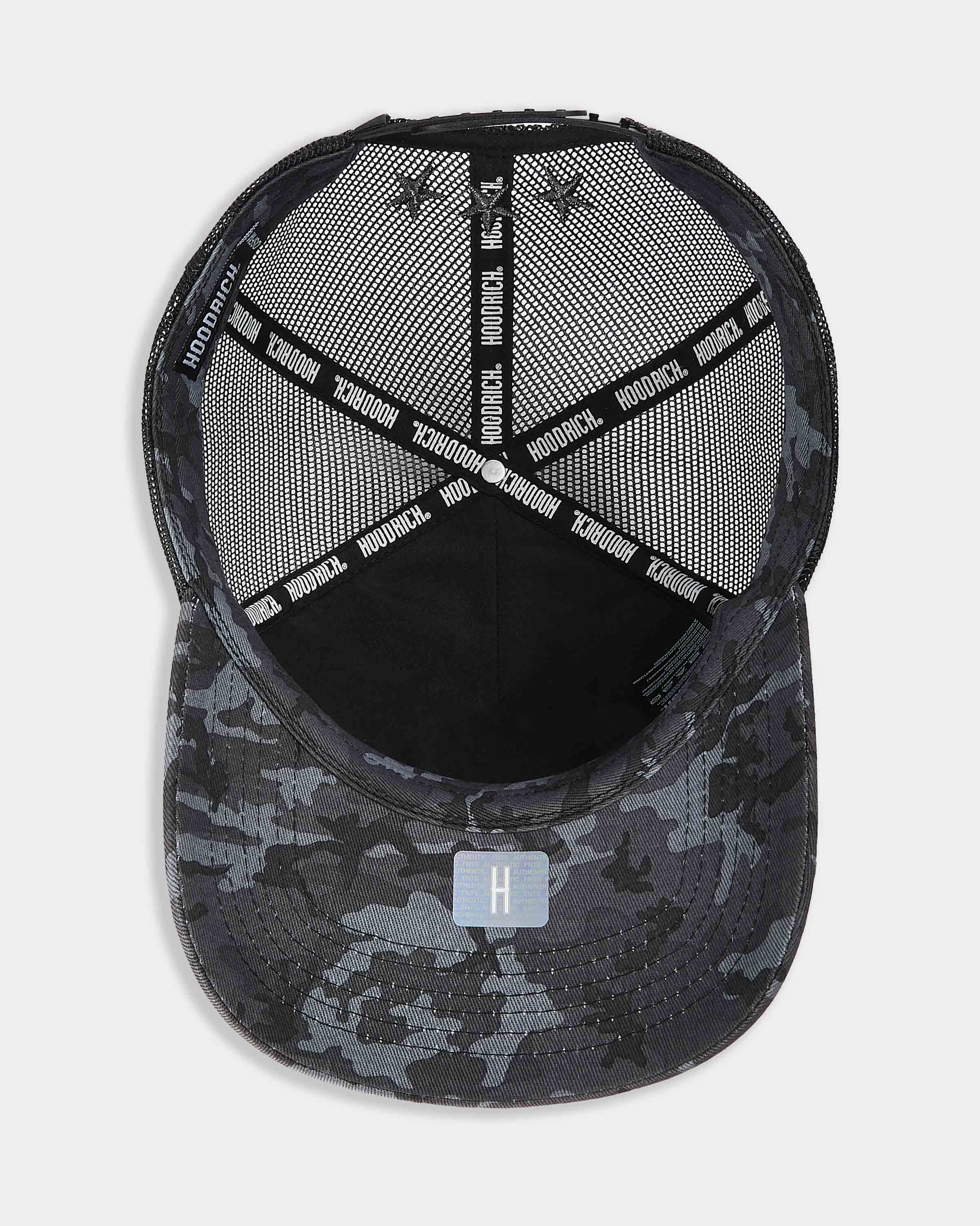 Black and gray camouflage baseball cap with mesh back on a light gray background